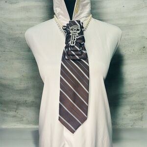 Sears Brown Necktie with Blue and Silver Stripe features Fashion inspired brooch